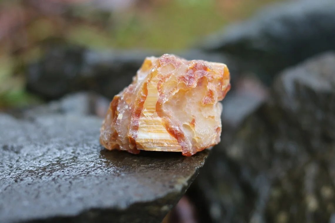 Carnelian agate river stone close-up detail